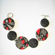 Bracelet (rond miro rouge et gris)
